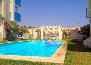 Гостиница 2 bedrooms appartement at Hammamet 100 m away from the beach with sea view shared pool and balcony  Хаммамет